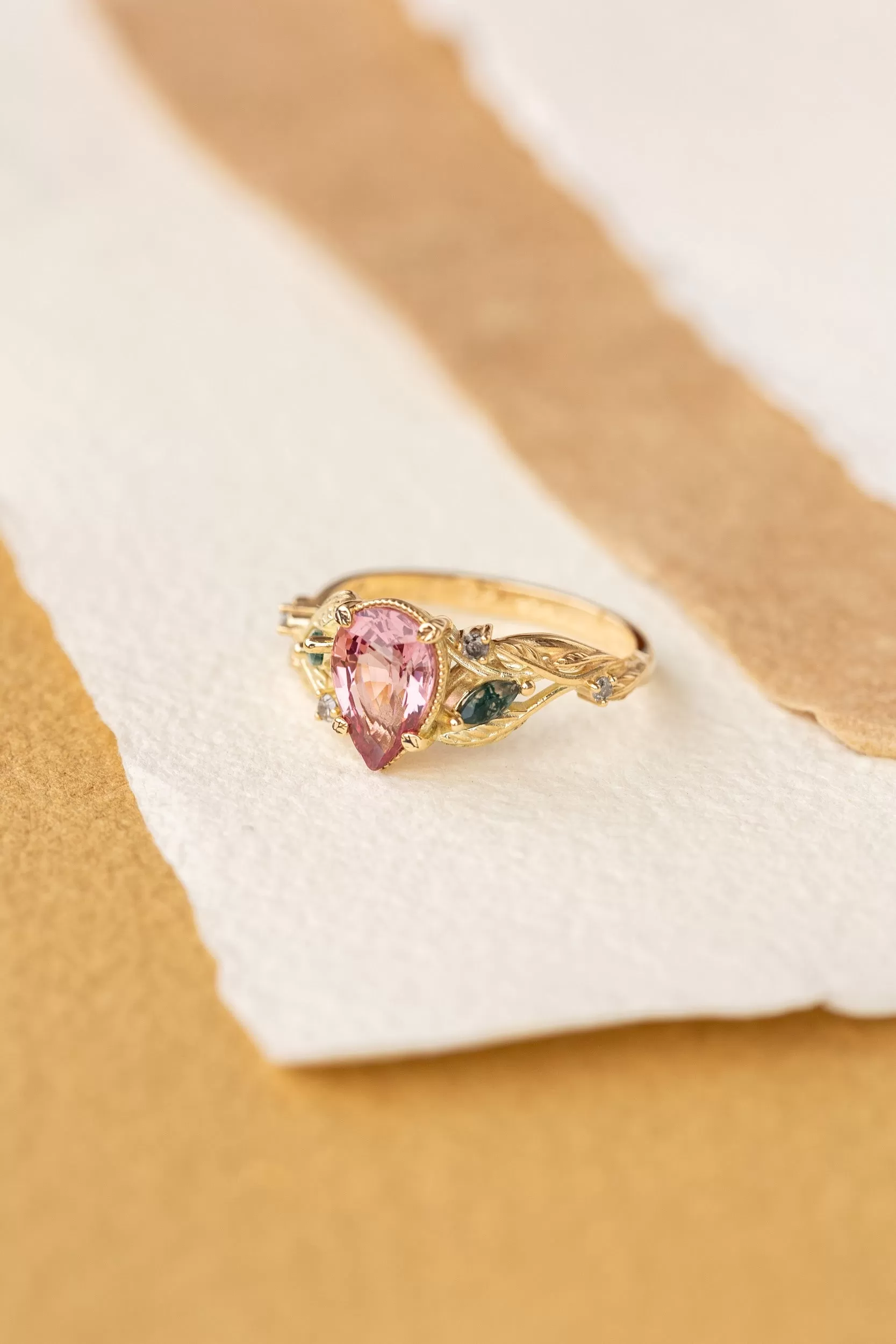 Pink spinel nature themed engagement ring with moss agates and salt and pepper diamonds / Patricia